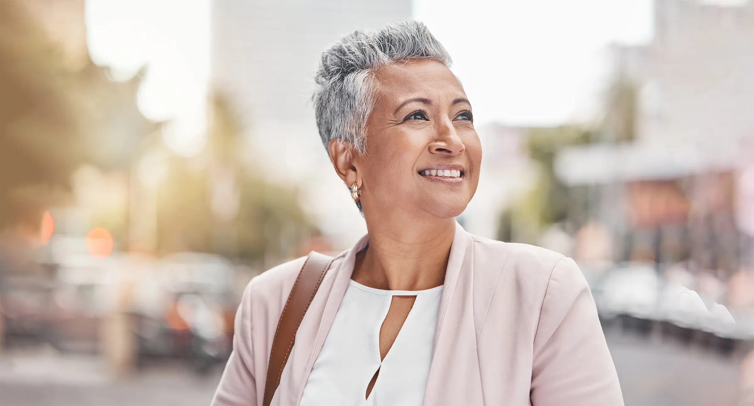 mature woman enjoying clear vision in the city